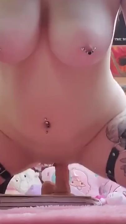 Big tits nympho jumps on dildo