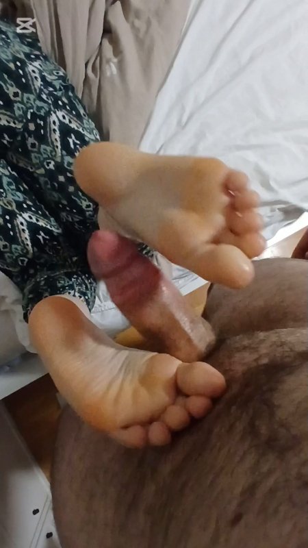 My wife gives me a footjob for the first time